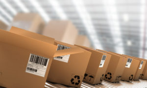 Shipping crates on conveyor belt