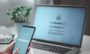 Login password screen on laptop and phone