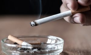 Image of a burning cigarette for a story about a panel discussion at the G2E conference in regards to banning smoking at Pennsylvania casinos.