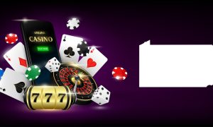 Image showing online casino gaming with playing cards and a slot wheel, along with the PA state outline for a story about the top highlights from the PA online casino market this year.