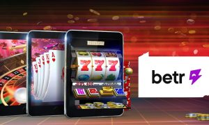 Image showing online casino gaming with playing cards and slots on phones along with the PA state outline featuring the Betr logo for a story about Betr receiving market access to eventually launch its online casino and sportsbook in the Keystone State.