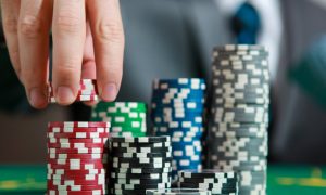 Image of a poker player with chips for a story about the Pennsylvania poker schedule for January 2024.