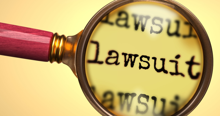 Lawsuit text within magnifying glass
